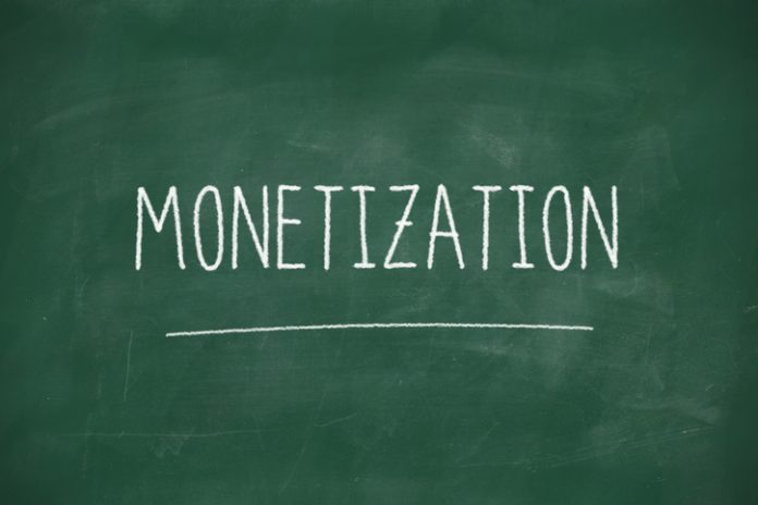 Should I monetize my APIs? Monetization handwritten on school blackboard
